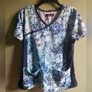 Koi Lite Teal and Navy Floral and Animal Print Scrub Top with Side Panels